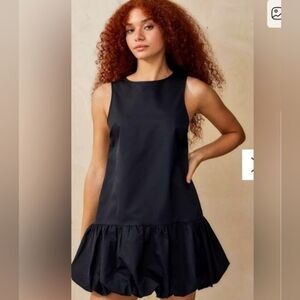 Motel Rocks B.                Black Sleeveless Ruffle-Hem Mini Dress